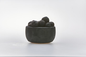 Dried lime shot on white background