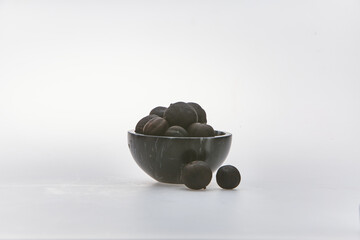 Dried lime shot on white background