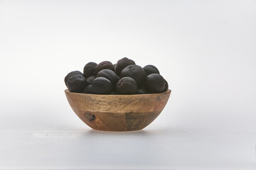 Dried lime shot on white background