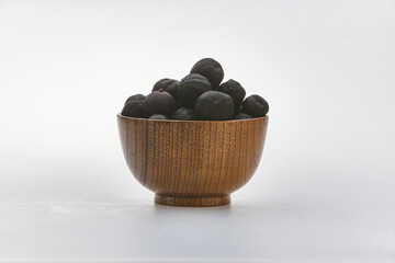 Dried lime shot on white background