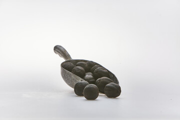 Dried lime shot on white background
