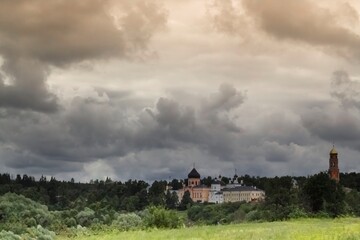 View of the monastery of David's deserts against the background of picturesque clouds