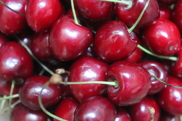 Sweet, red cherries on a white background