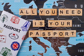 All you need is your passport slogan on europe map. Passport with stamps. Traveling without borders concept.