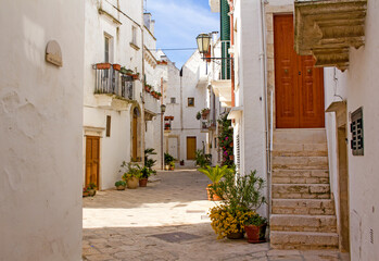 Picturesque street in the town of Locorotondo in Southern Italy. 