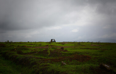 Lone auto rickshaw in beautiful meadows