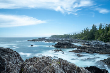 Fototapeta na wymiar Crashing waves on the rocks near Brown Beach Ucluelet, BC, Canada