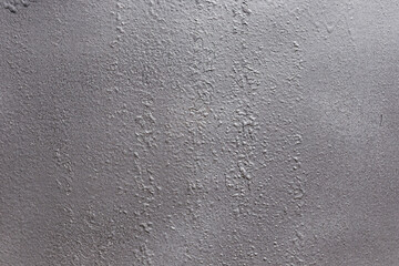 Gray soft metal surface as a background. Texture gray and solid color background with unique and beautiful grunge textures.
