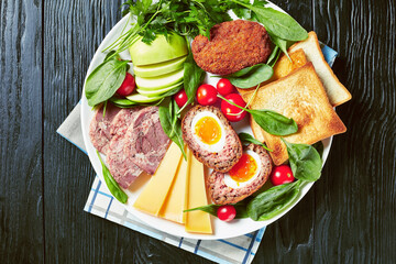 toasts, cheese, apple, scotch eggs, greens, ham