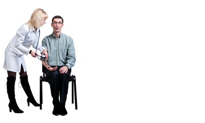 Female doctor in a white coat measures pressure to a man sitting on a chair, on a white background, isolated