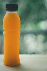 Pure orange juice in bottle for good healthy