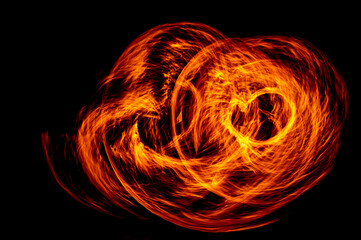 Circle of Fire flame with movment isolated on black isolated background - Beautiful yellow, orange and red and red blaze fire flame texture style.