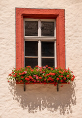 Fototapeta na wymiar Red Framed Window
