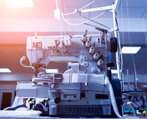 Fabric industry production line. Textile factory. Working tailoring process