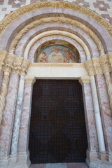 Some entrance doors of the Basilica of Santa Maria di Collemaggio (13th century) - L'Aquila - Abruzzo - Italy
