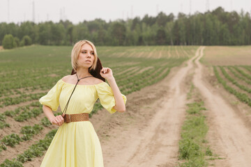 Cowboy girl in the field