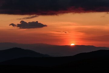 mountains sun sunset clouds sky