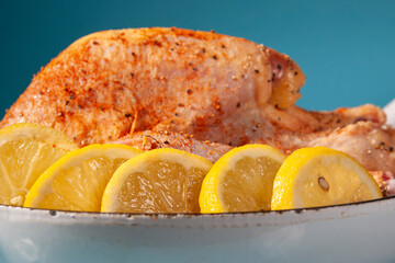 chicken with lemon in a pan