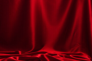 Red silk or satin luxury fabric texture can use as abstract background.