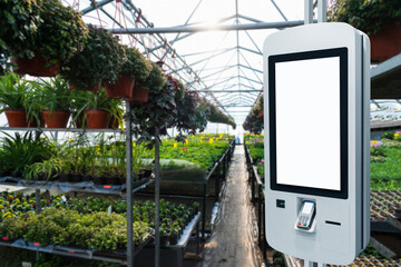 Self-service desk with touch screen in a flower greenhouse