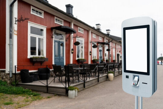Self-service desk with touch screen on a street restaurant	