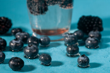 fresh summer drink with berries and lemon