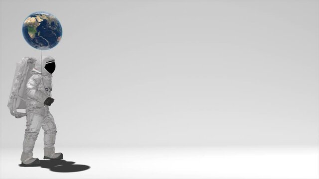 Atsronaut with a ball in the shape of the Earth is walking on a white background. Elements of this video furnished by NASA. 3d rendering. With alpha channel.