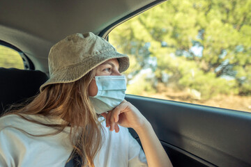 Girl looking out of the car window