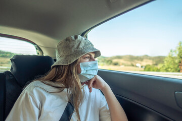 Girl looking out of the car window