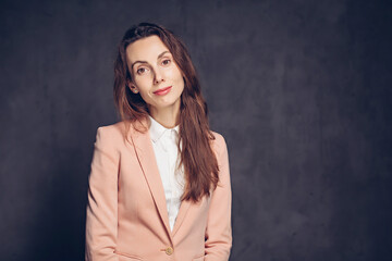 Sad adult caucasian woman on dark background