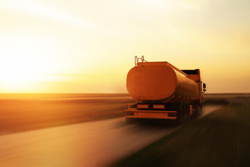 Logistics concept. Truck on country road, motion blur effect