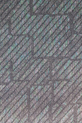 Seamless textile blue and gray checkered fabric material. Dark color textured background.