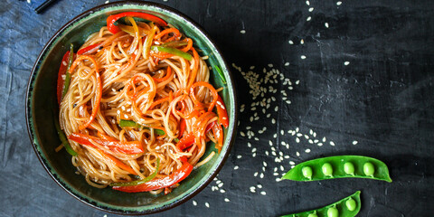 rice noodles with vegetables cellophane pasta food background top view copy space for text organic eating healthy