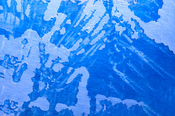 Whitewashing the walls with blue lime. Natural textured basckground