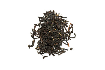 Leaves of black premium dry tea on a white background