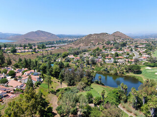 Aerial view of residential neighborhood surrounded by golf in green valley, Rancho Bernardo, San...