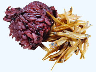 Steamed Riceberry with Crispy Fried Small Salted Fish on White Background