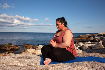 Fototapeta na wymiar woman praying or meditating