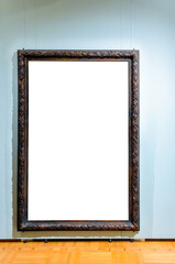 Big old luxury antique black frame on blue wall