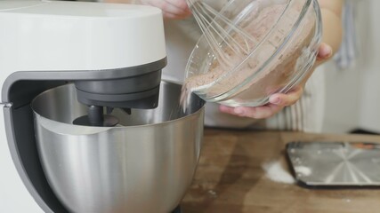 Mixing Cocoa Powder, Flour and Beaten Eggs.