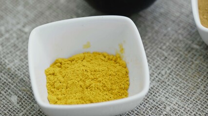 Top voew of Aromatic spices in white plates