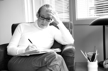 Female counselor working overtime in her office.