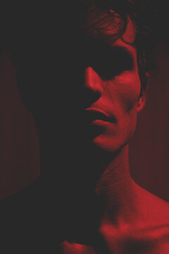 Dark red portrait of a man