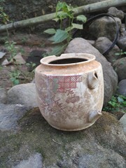 Fototapeta premium acient teapot left over from war