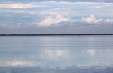 Fototapeta premium Pristine water scenes with reflections and brilliant blue skies
