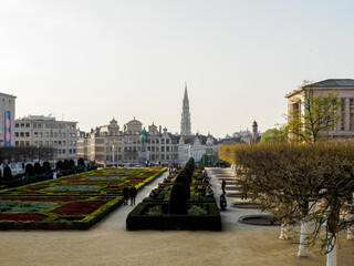 a park in brussels with the city in the background