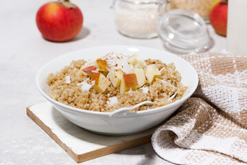 quinoa with apple and coconut for healthy breakfast