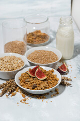 range of products made from oats for healthy food on white background, vertical
