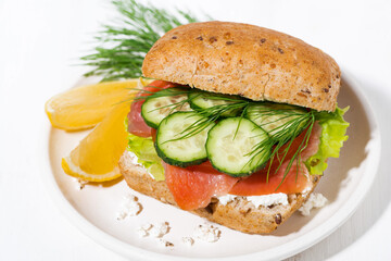 sandwich with salted fish, fresh vegetebles and cream cheese, top view