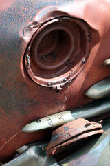 Rusted metal objects from vehicles and architecture with oxidation and traces of paint
